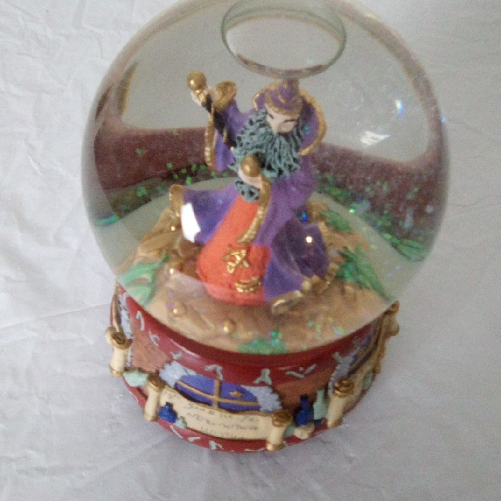 Mystical Wizard Snow Globe with Red and Purple Accents